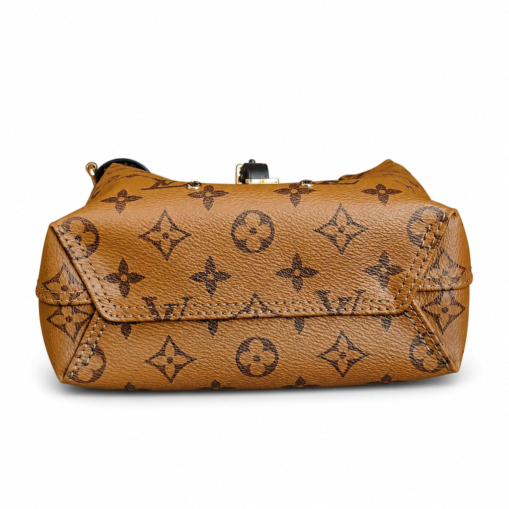 Louis Vuitton Atlantis Canvas Leather Handbag