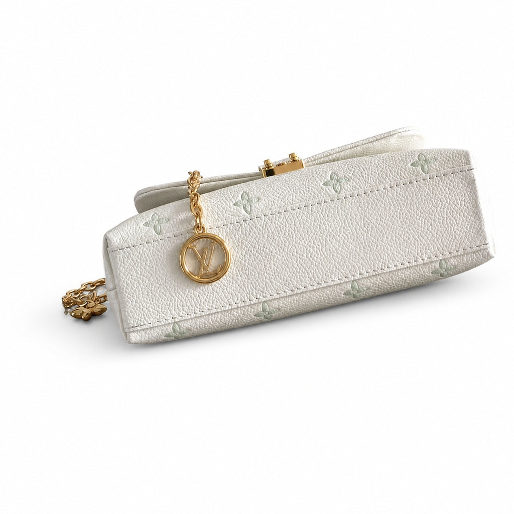 Louis Vuitton Madeleine Leather Handbag