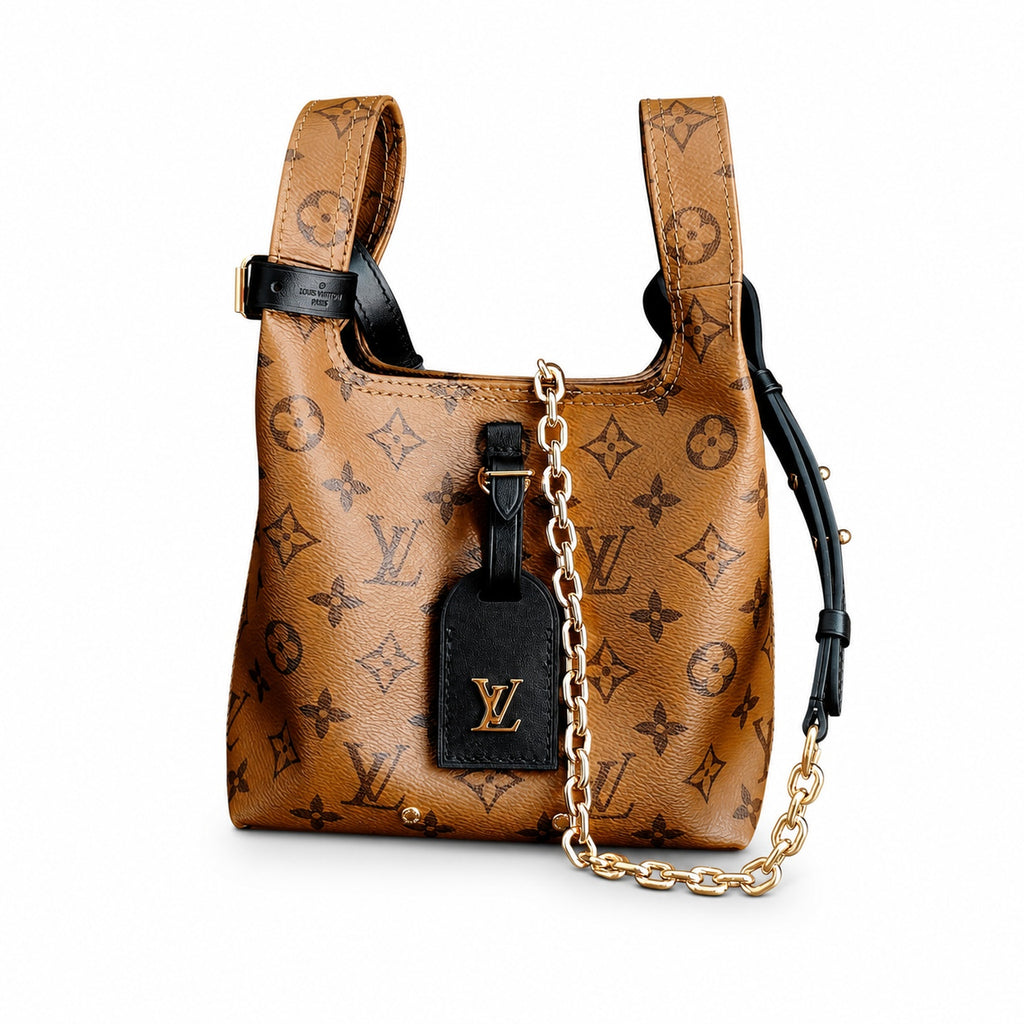 Louis Vuitton Atlantis Canvas Leather Handbag