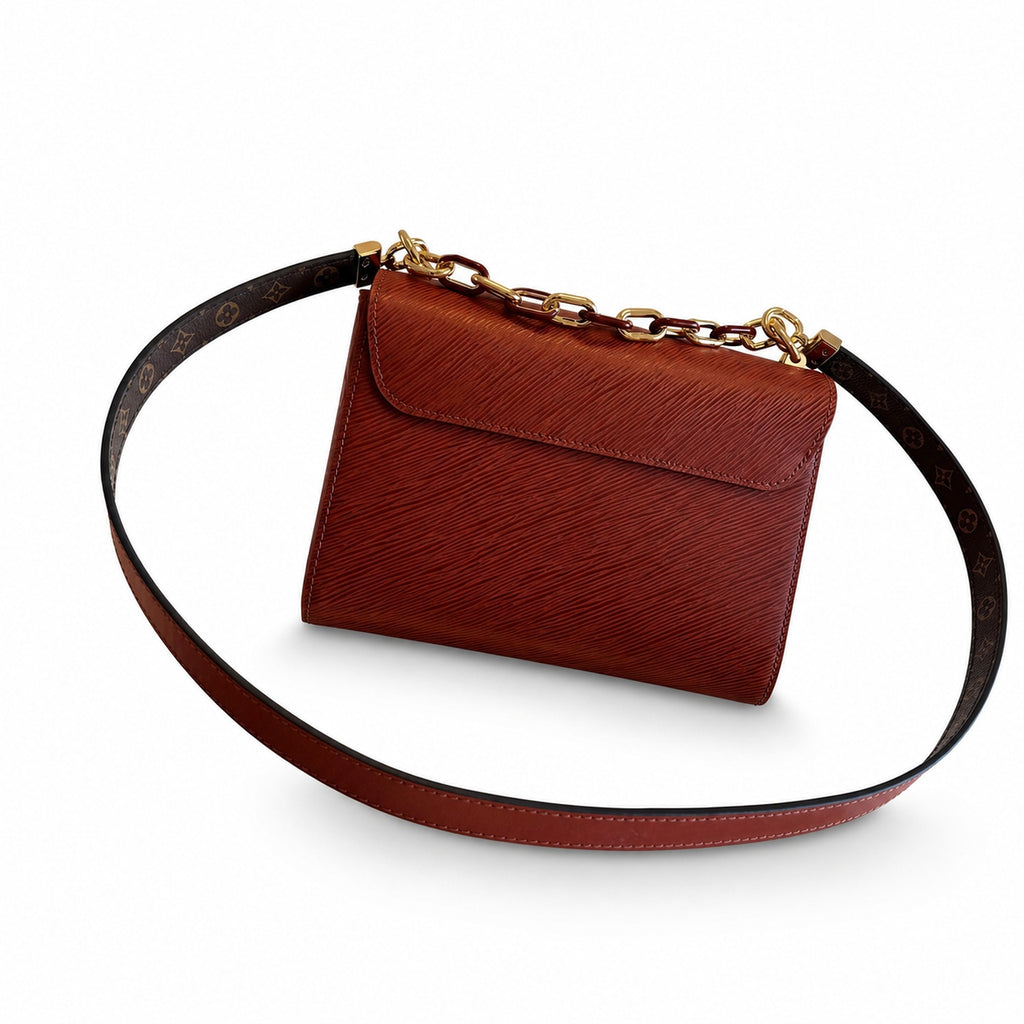 Louis Vuitton Twist Leather Gold Handbag