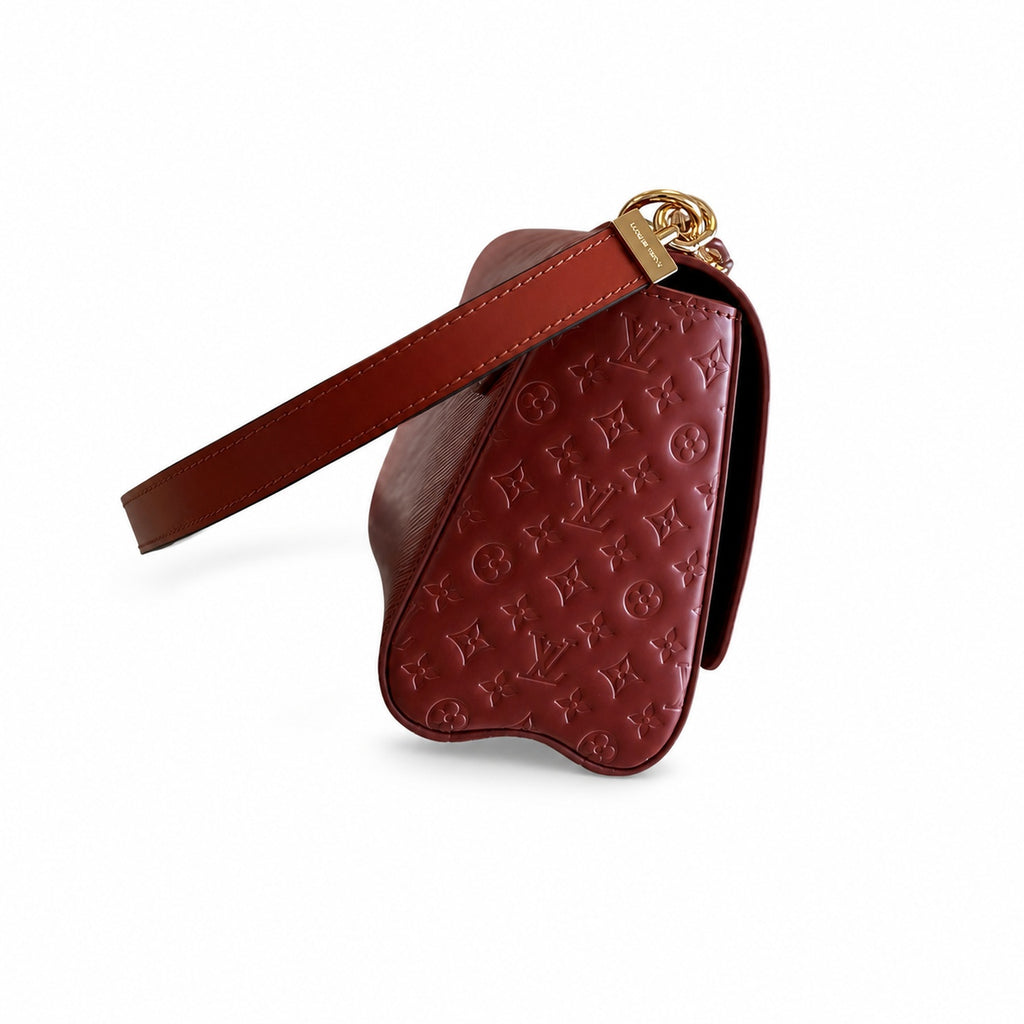 Louis Vuitton Twist Leather Gold Handbag