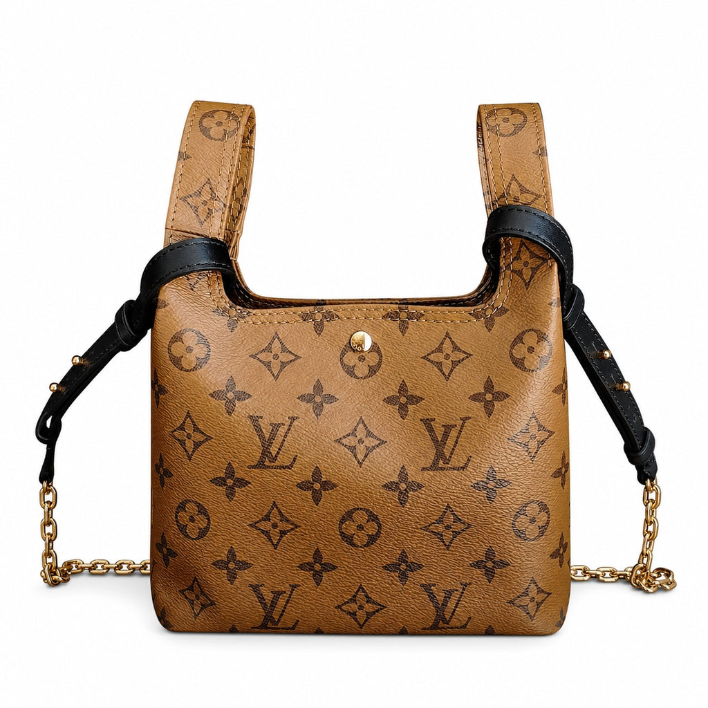 Louis Vuitton Atlantis Canvas Leather Handbag