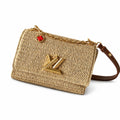 Louis Vuitton Twist Raffia Leather Handbag
