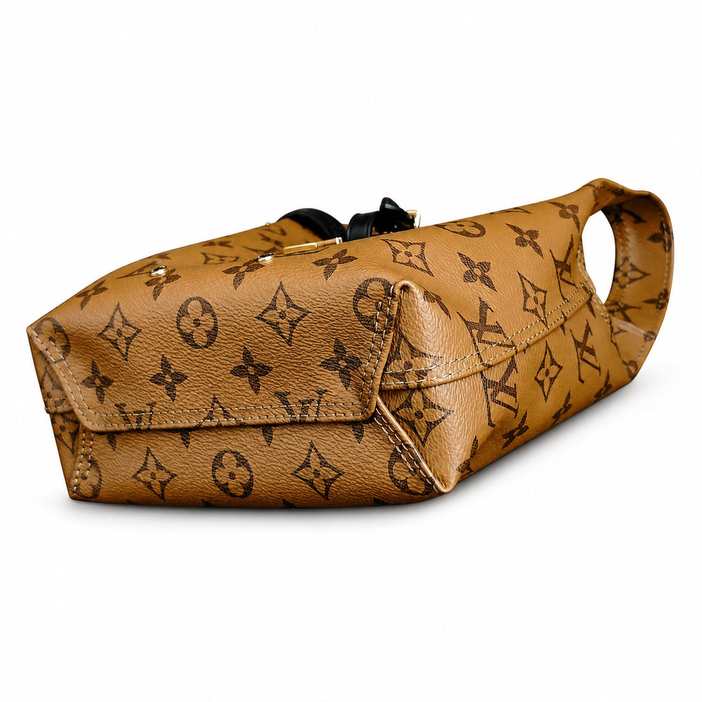 Louis Vuitton Atlantis Canvas Leather Handbag