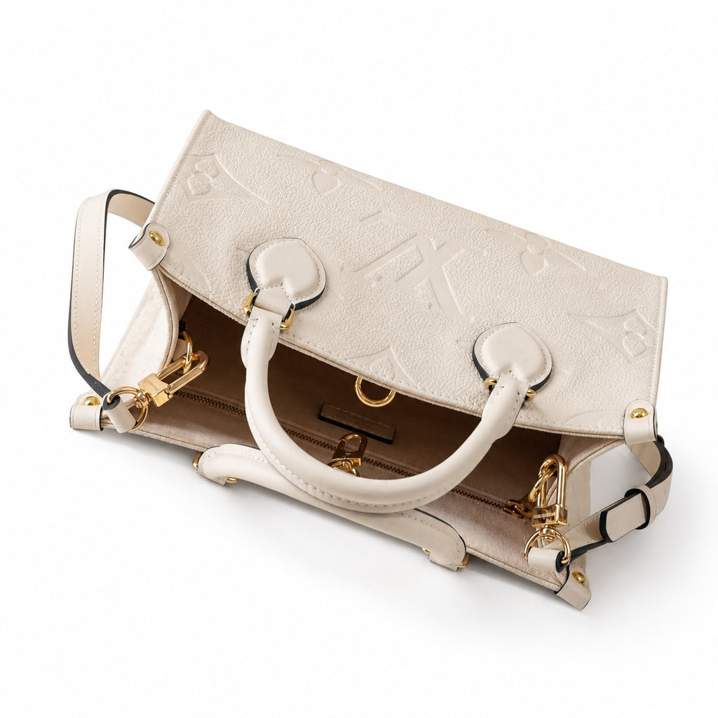 Louis Vuitton OnTheGo Mini Leather White Handbag