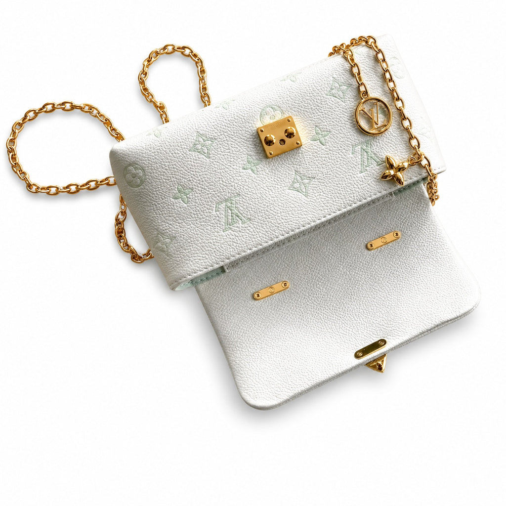 Louis Vuitton Madeleine Leather Handbag