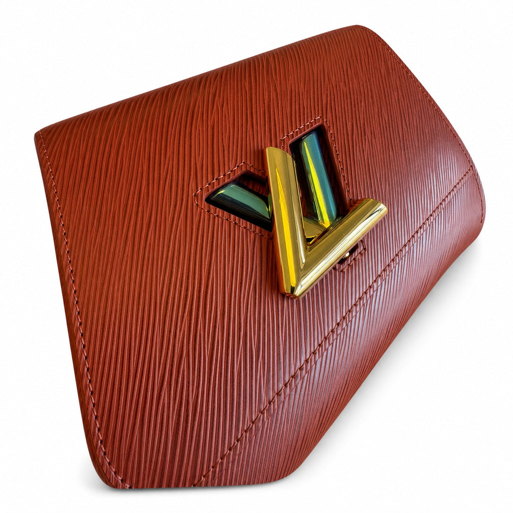 Louis Vuitton Twist Leather Gold Handbag